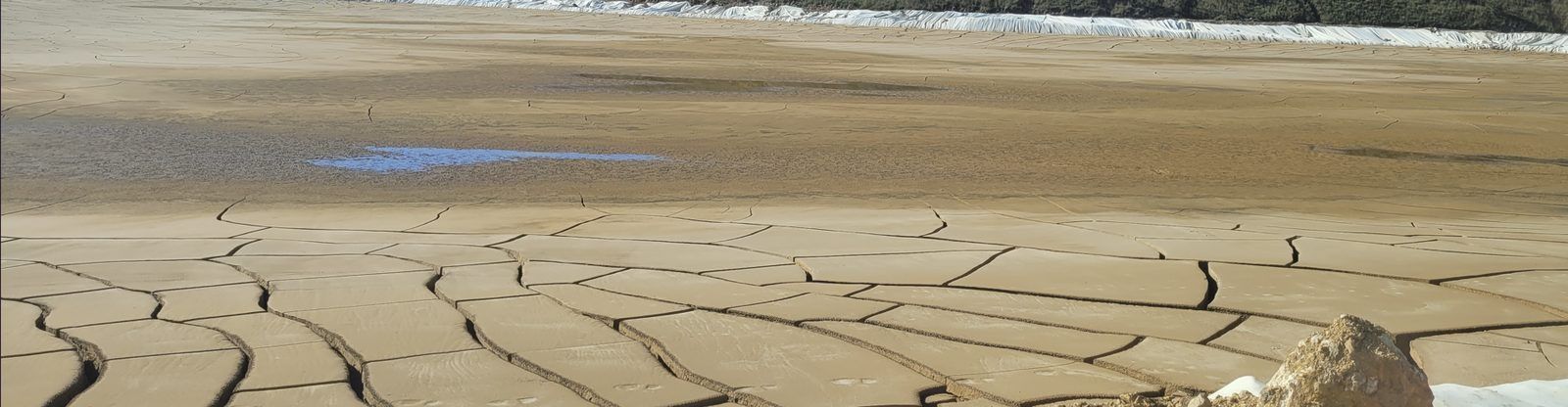 Dried tailings deposit with a cracked surface